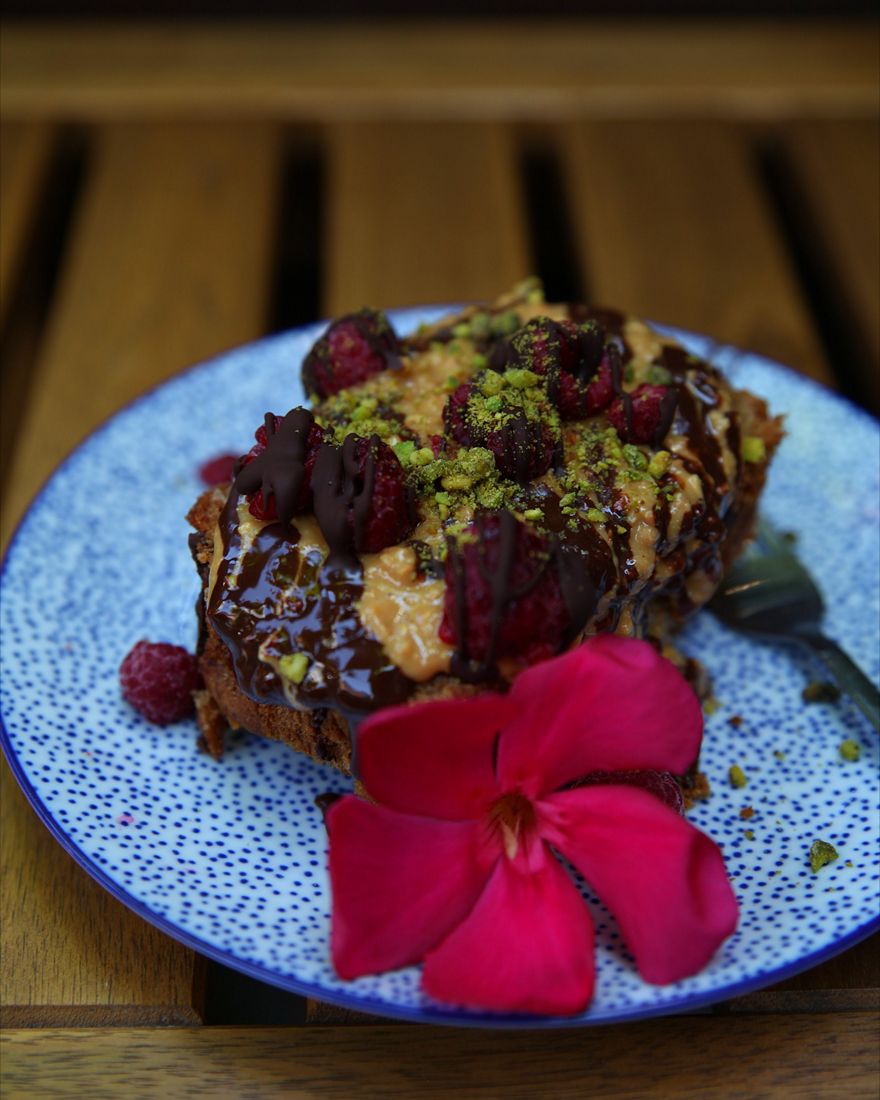 Plated dessert with an edible flower